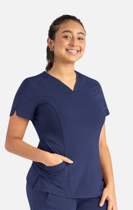20302 Focus V-Neck Petal Back Hemline Top by Maevn 